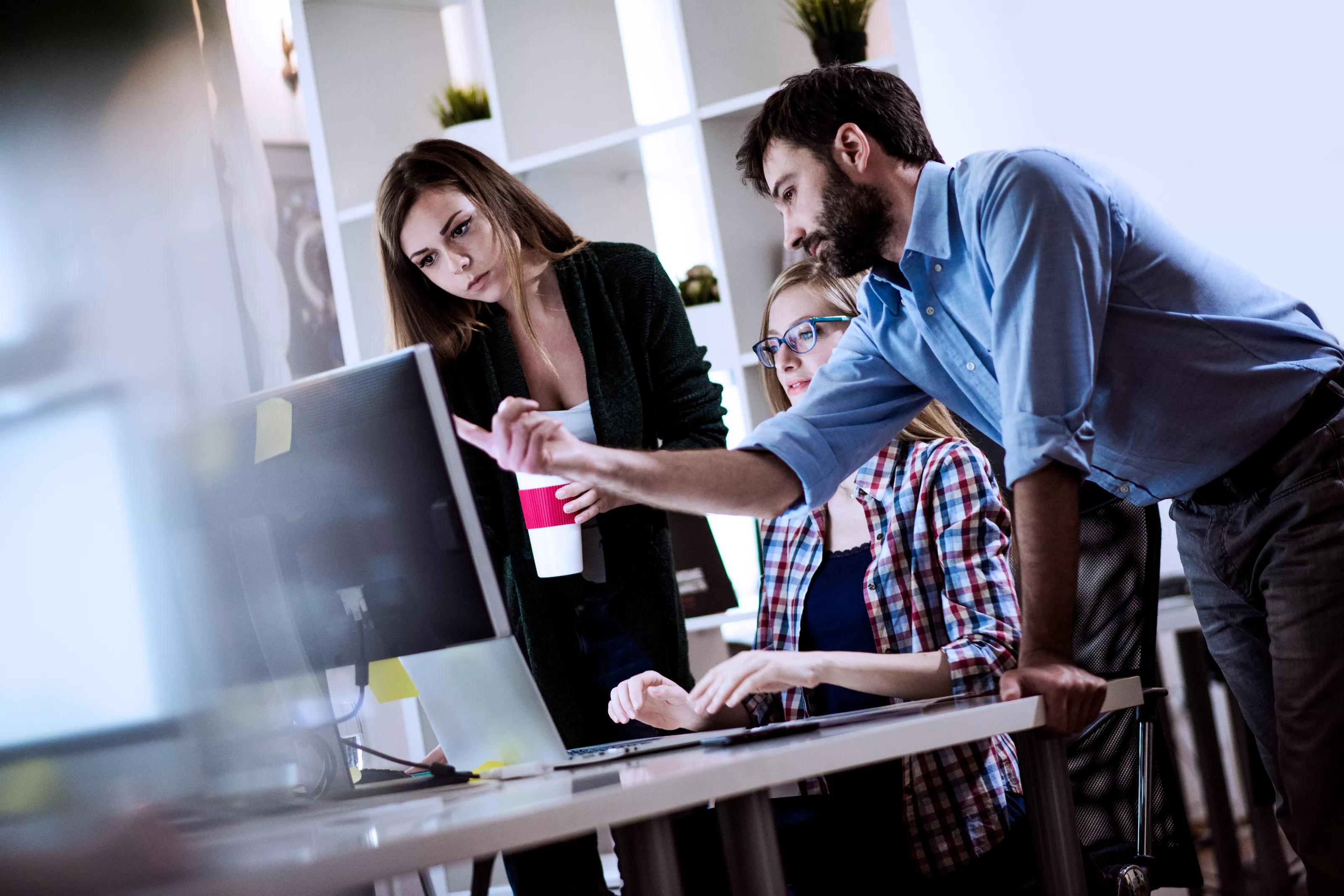 Three People Working in the Office