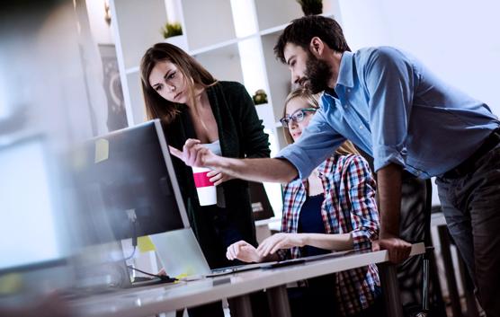 Three People Working in the Office