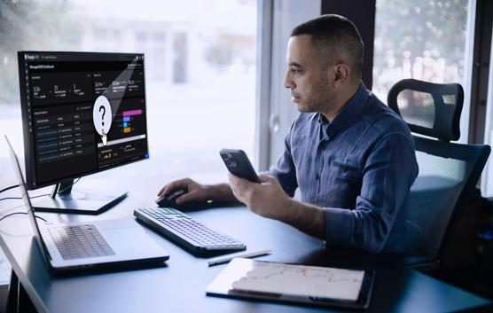 Businessman Using Computer Clicking Computer Mouse