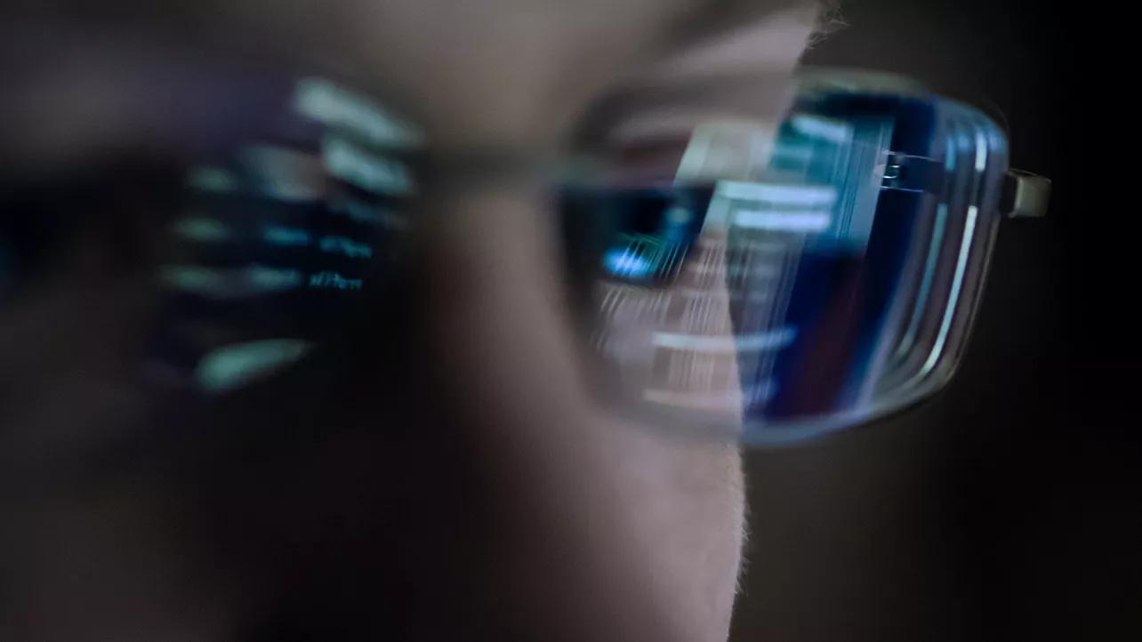 Woman With Glasses With Reflections