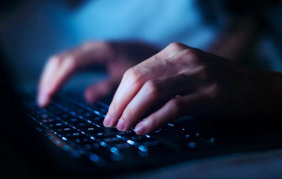 Female Hands on Keyboard