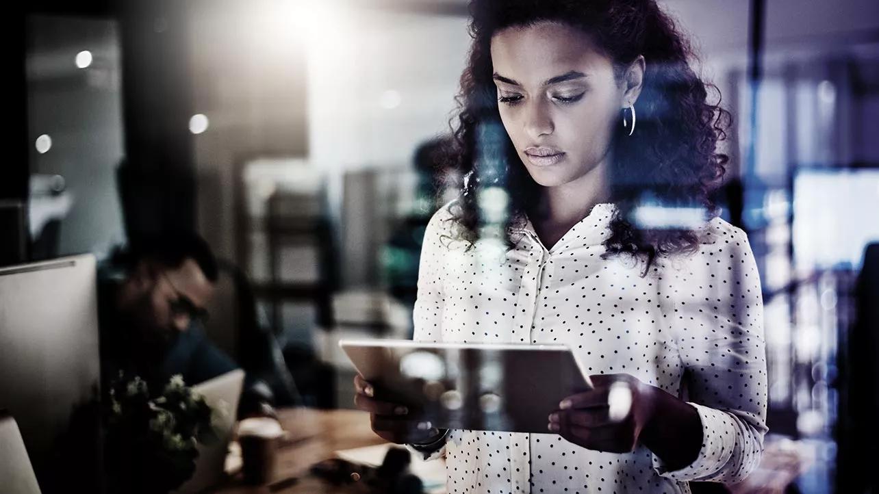 Woman on Tablet Glass Reflections