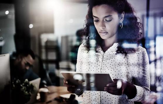 Woman on Tablet Glass Reflections