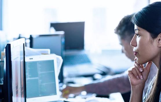 Woman Looking at Computer Monitor