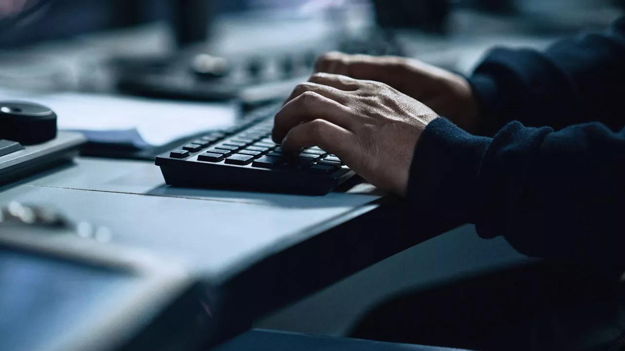 Male Hands Typing on Keyboard