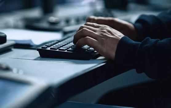 Male Hands Typing on Keyboard